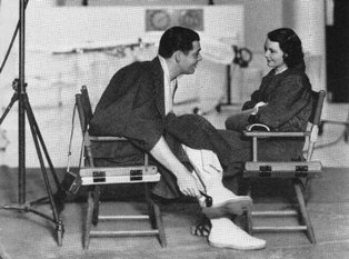 Clark Gable and Elizabeth Allan on the set of Men in White